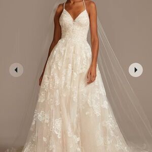 Ivory Oleg Cassini wedding dress.